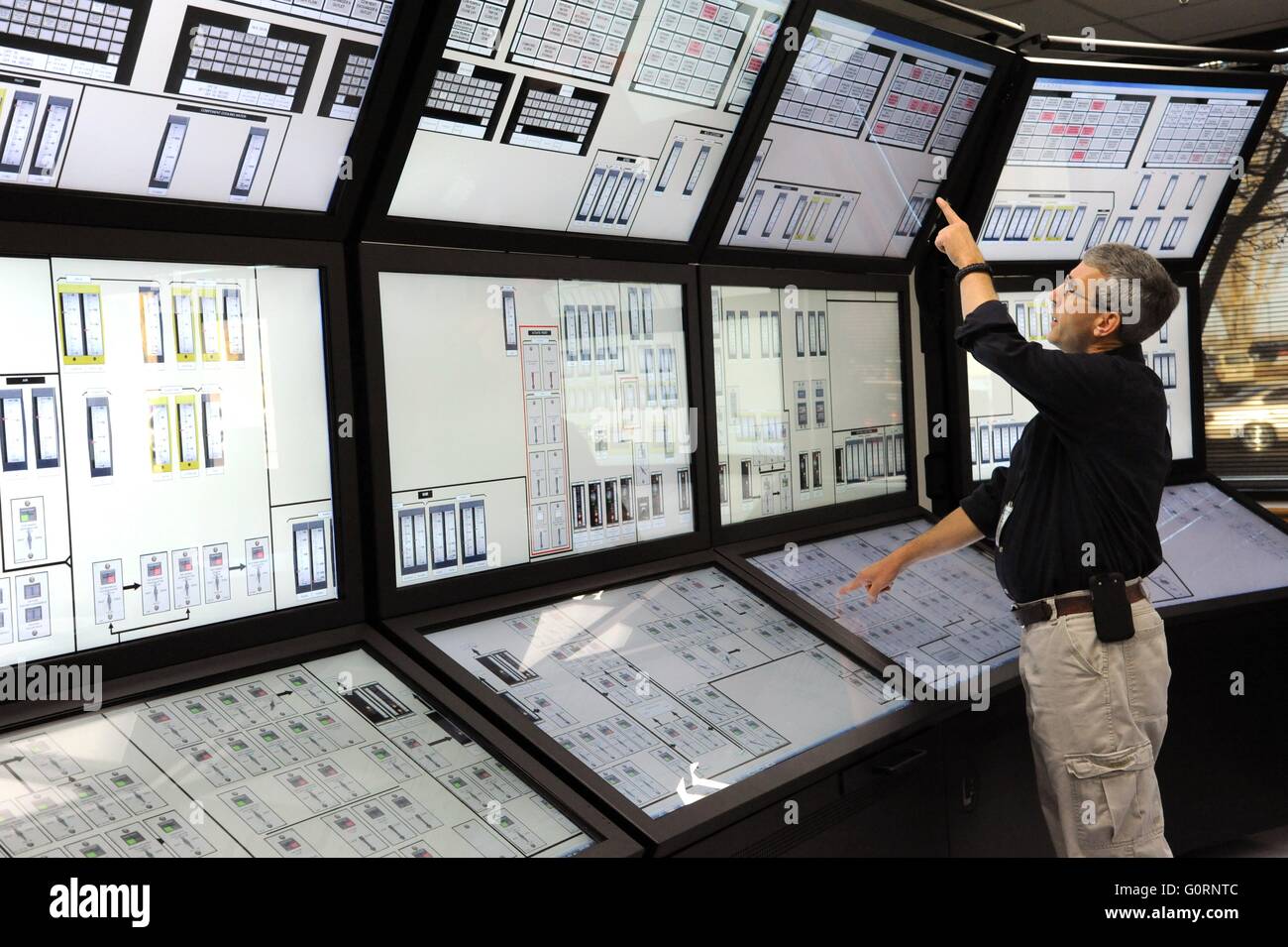 A scientist in the Human Systems Simulation Laboratory, a complete ...