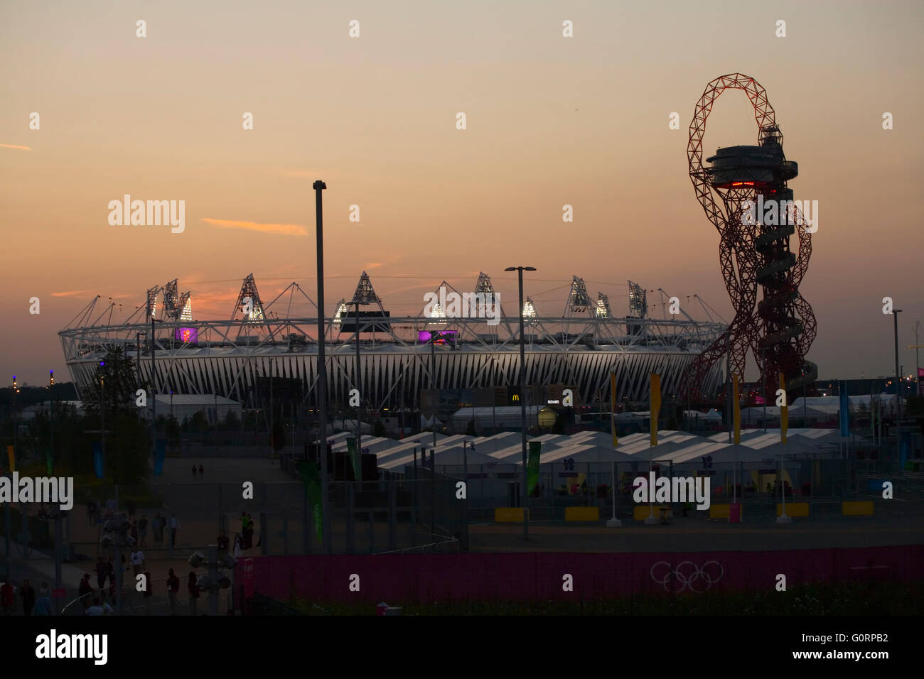 The London Olympic stadium and Orbit tower at Sunset Stock Photo