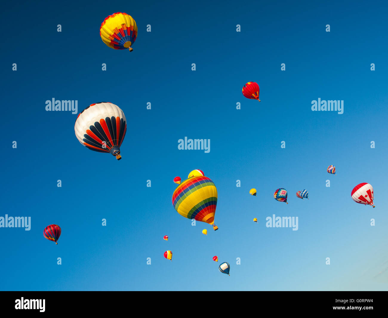 Colored hot air balloons on the Sunny blue sky Stock Photo - Alamy