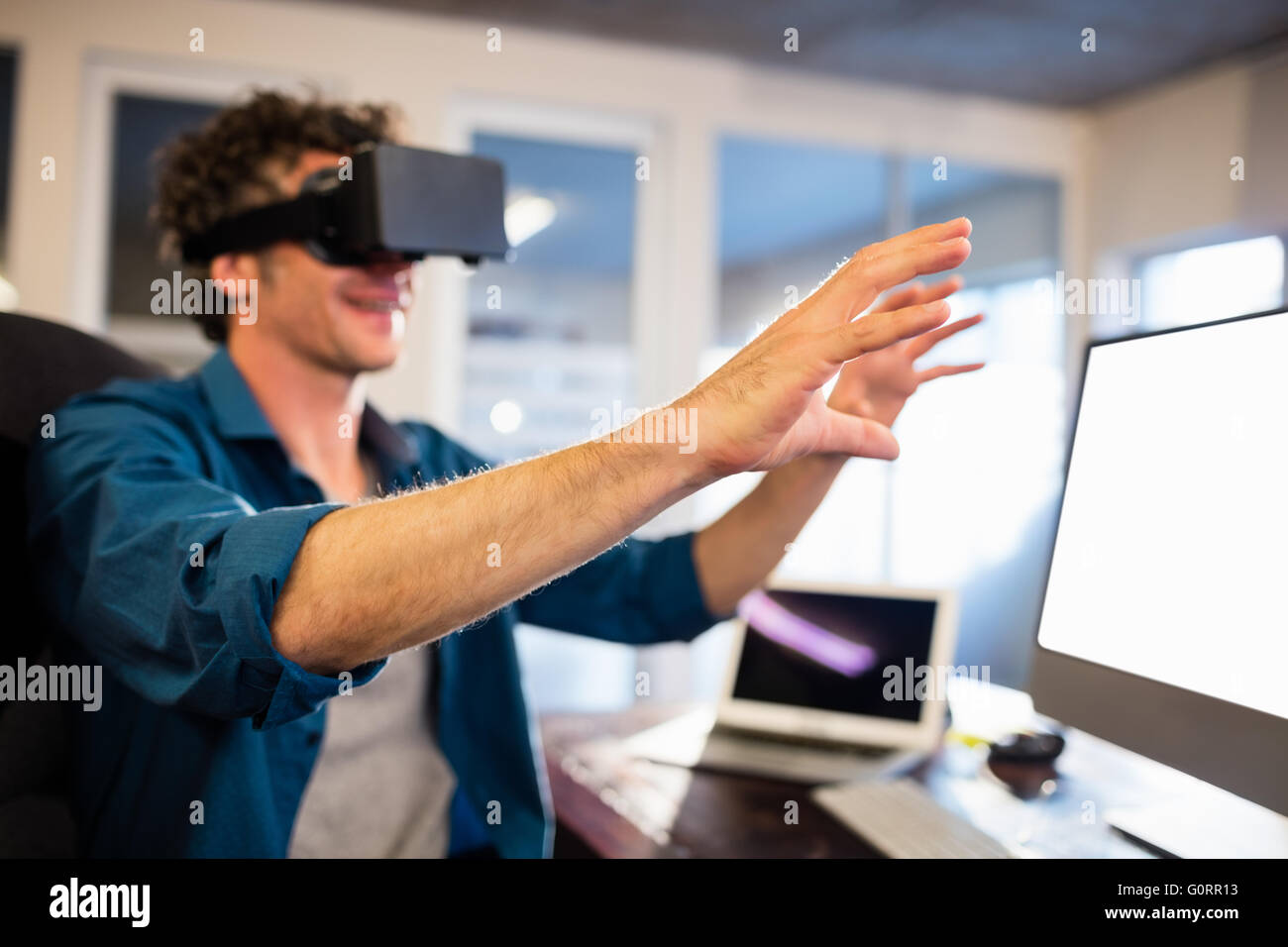 Businessman wearing virtual glasses Stock Photo Alamy
