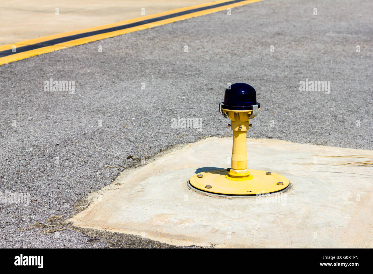 Ground side lamp taxiway at the airport Stock Photo