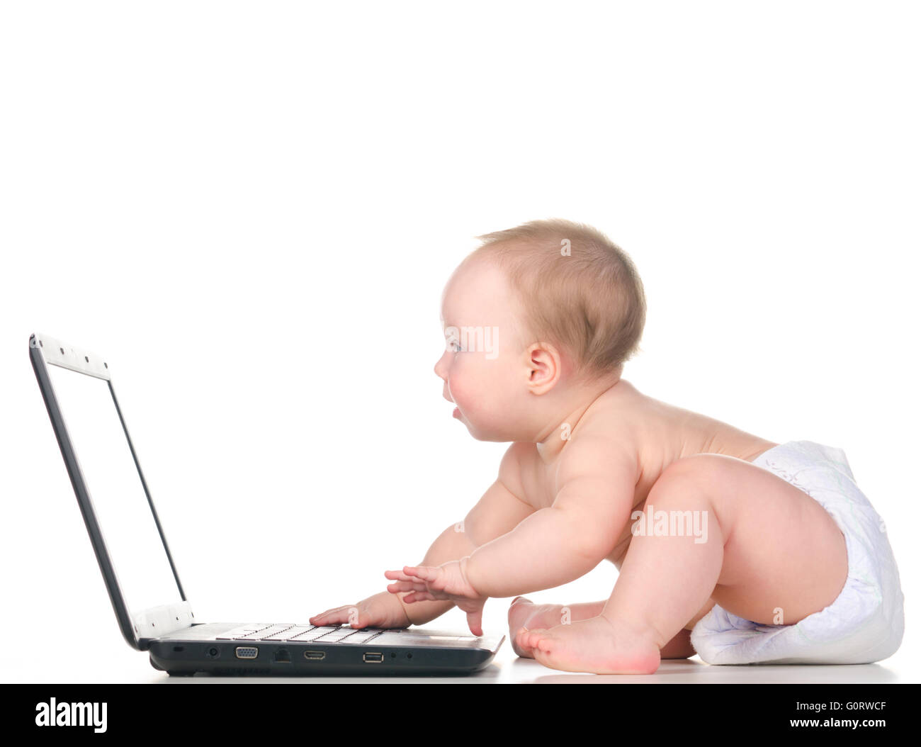 baby is working on laptop Stock Photo - Alamy
