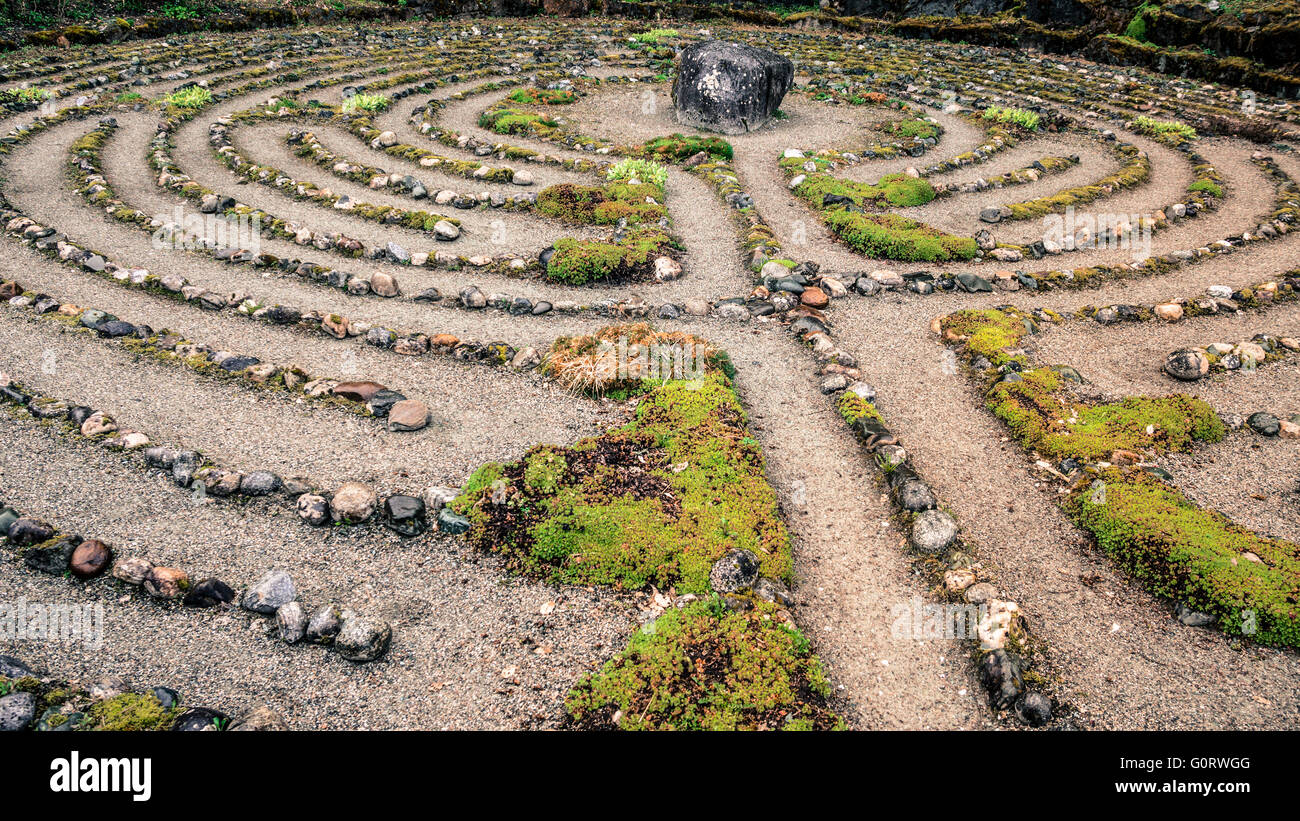 Old labyrinth meditation maze of stone. Stock Photo