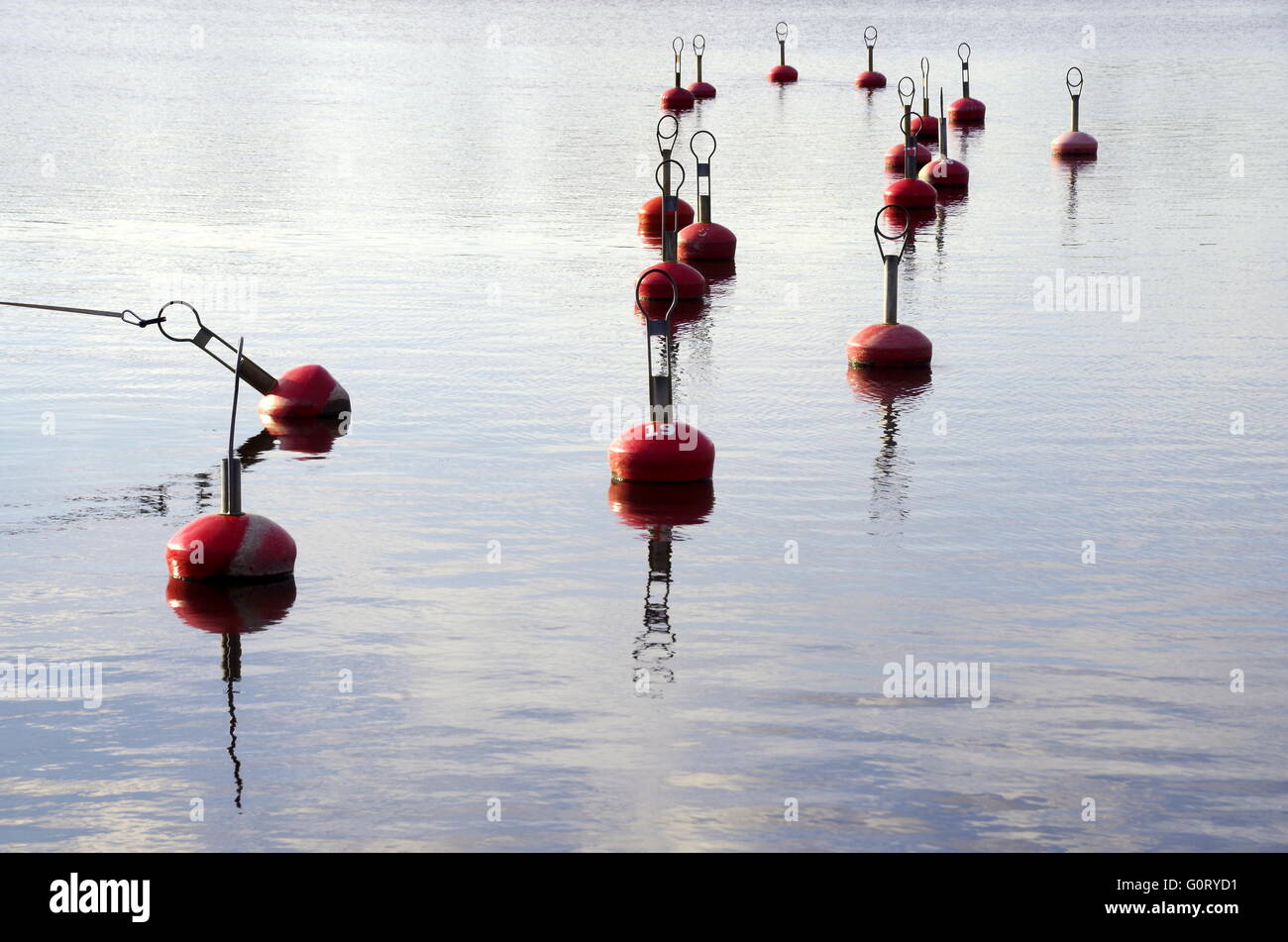 Red yacht club buoys in the water in Pärnu, Estonia Stock Photo