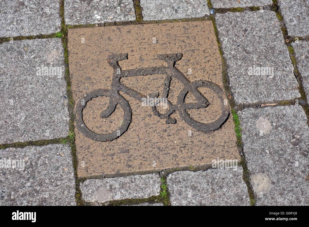 A cycle lane sign on a pavement in Bristol, UK Stock Photo