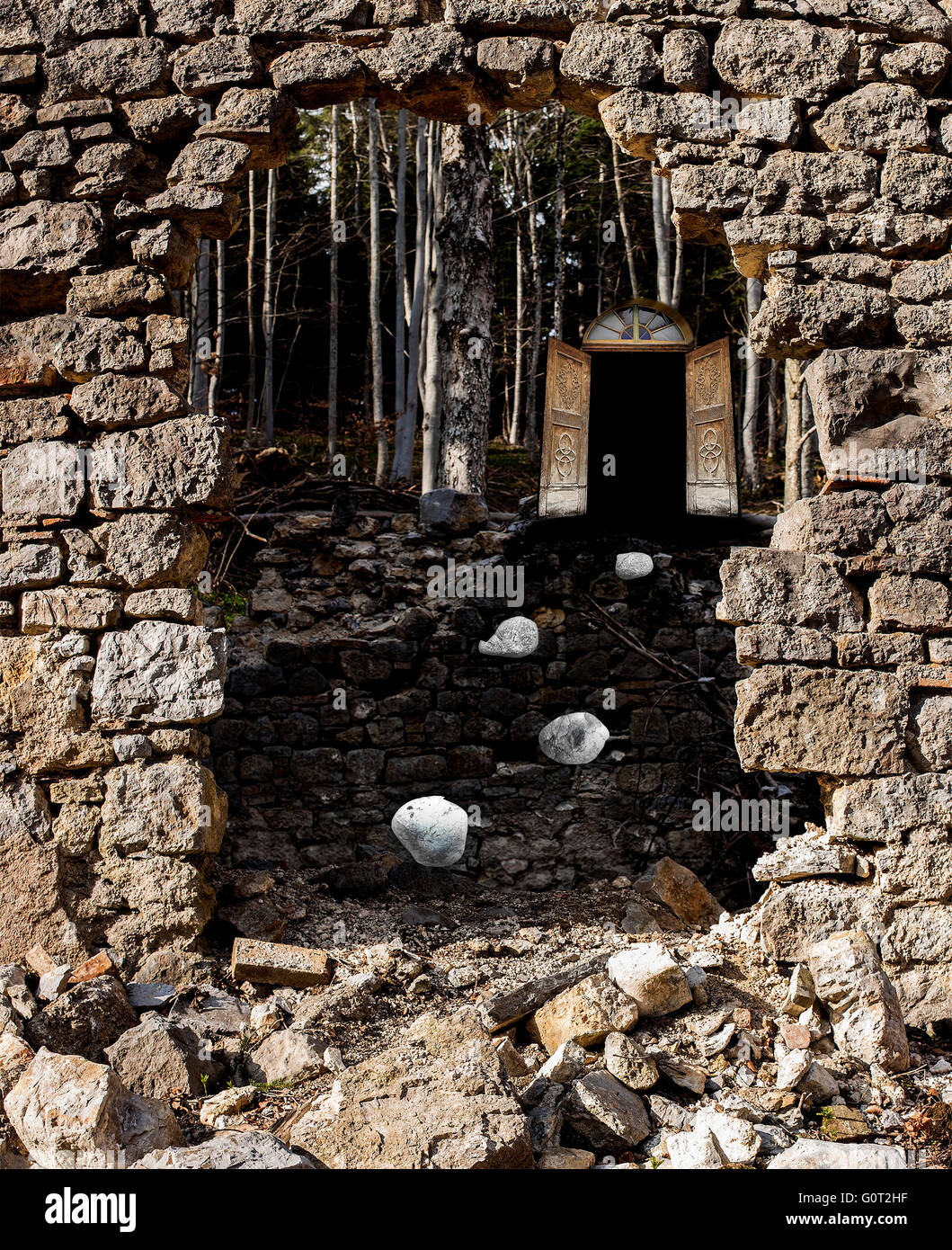 Demolished rock wall with an open opportunity door Stock Photo - Alamy