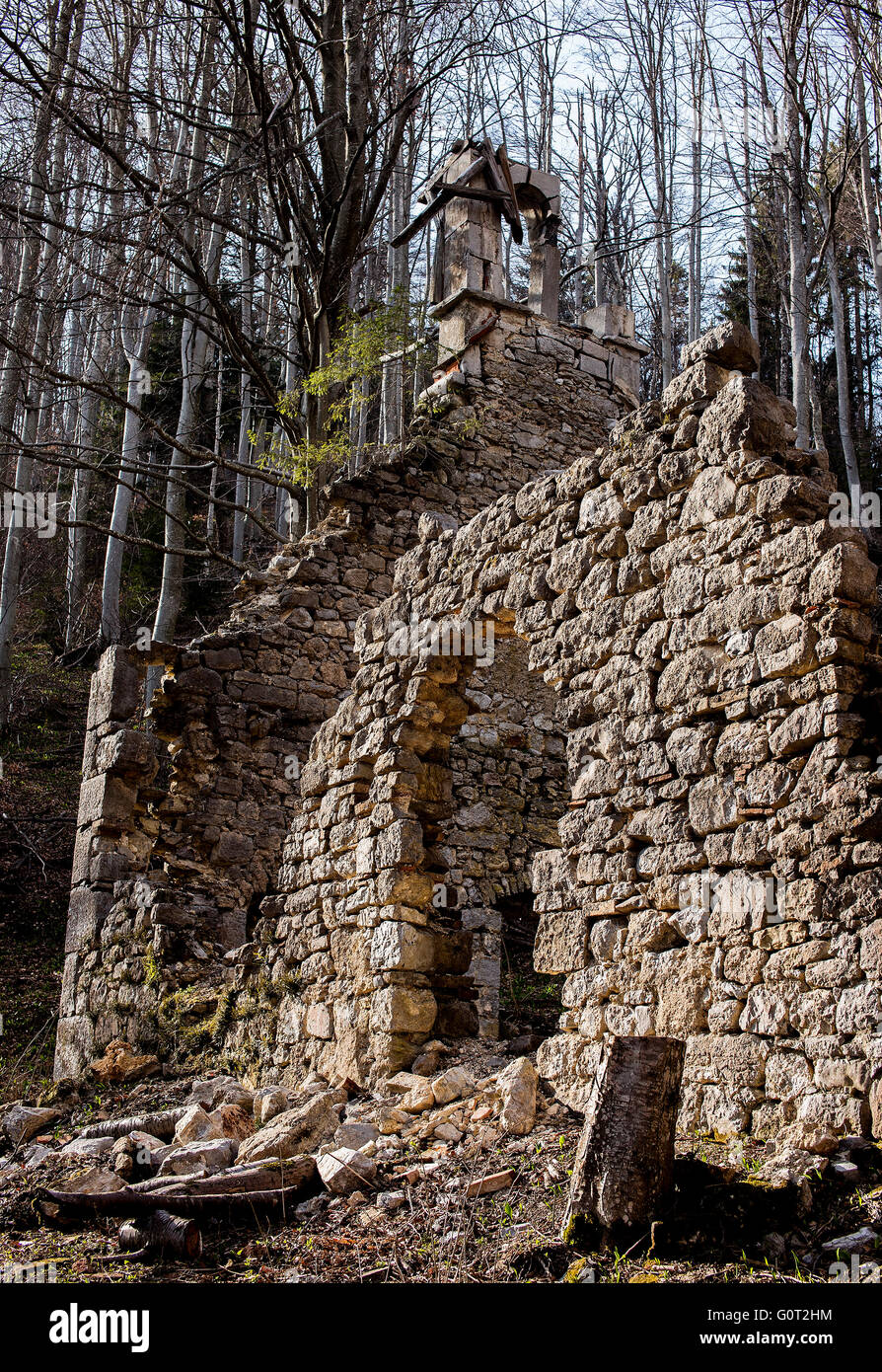 Old rock wall falling apart with church structure Stock Photo Alamy