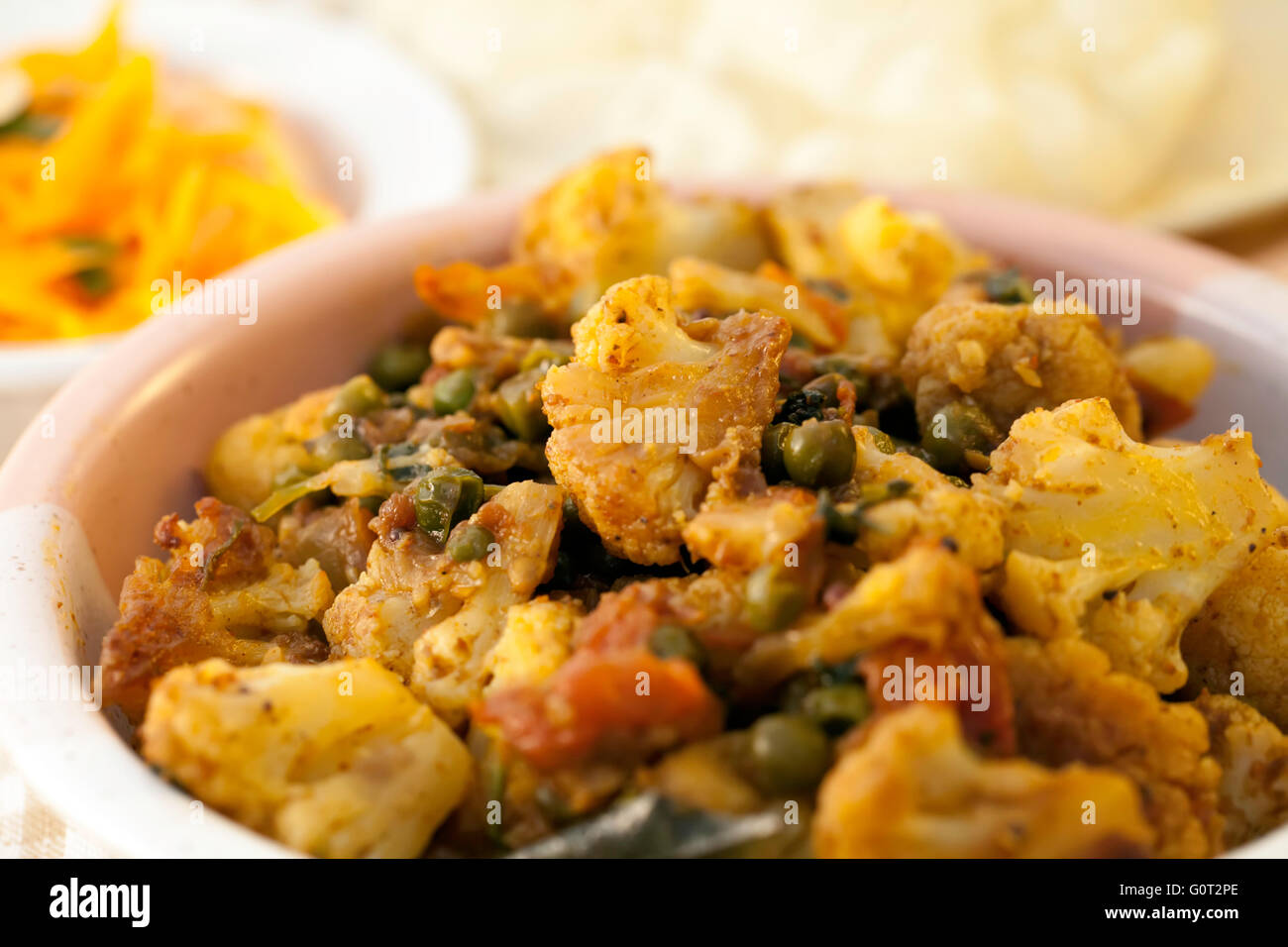 Traditional Indian Cauliflower and Pea Curry Stock Photo Alamy