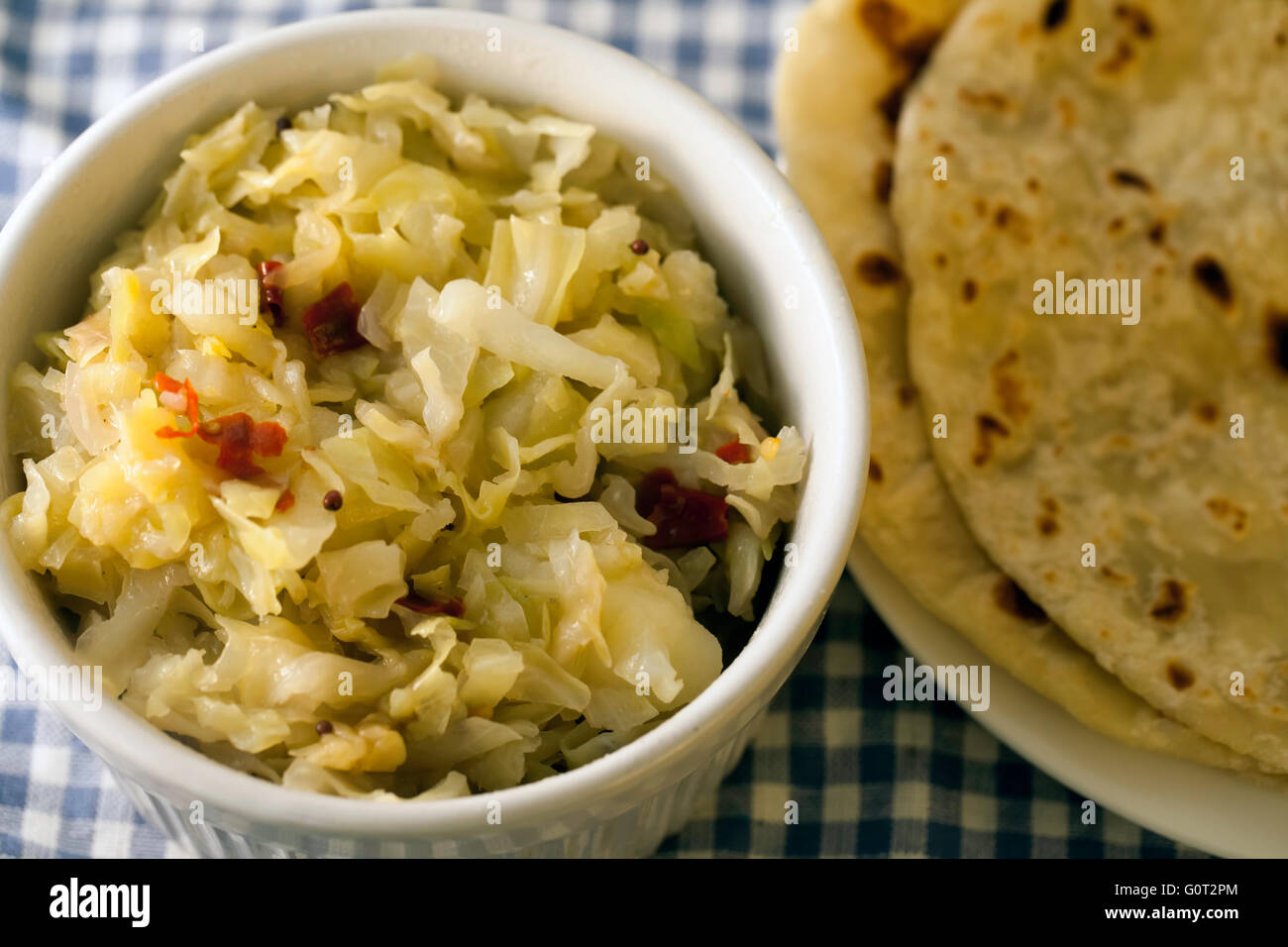 Traditional Indian Fried Cabbage and Roti Stock Photo