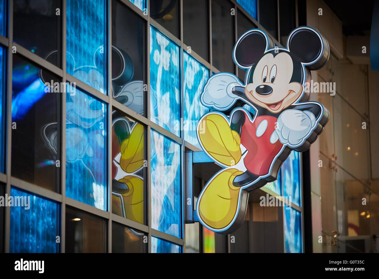 New York times Square   Disney store exterior Mickey Mouse logo sign Stock Photo