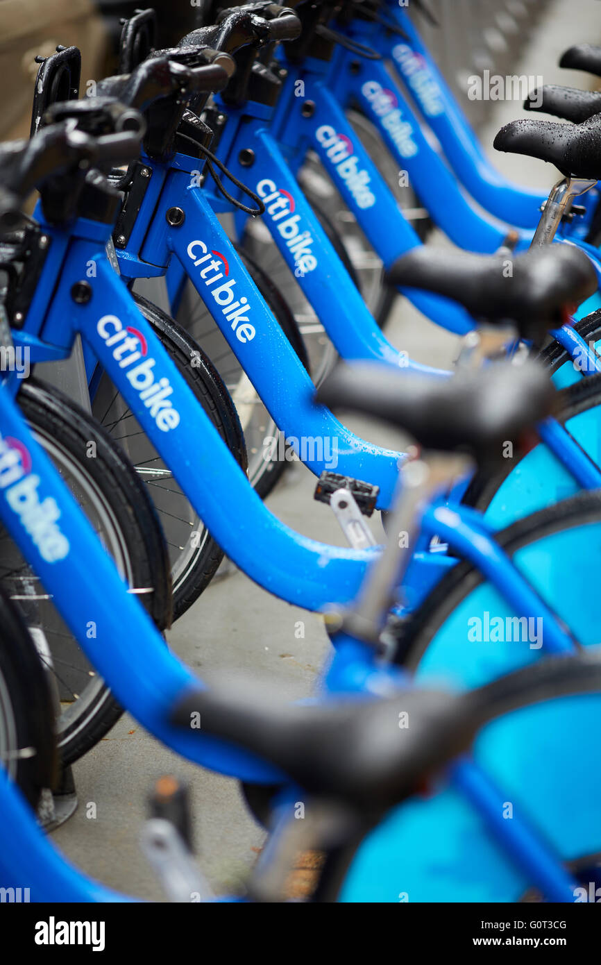 New york   Citi bike stack rows holding frame Bike bicycle cycling exercise riding rider biking active activity recreational fit Stock Photo