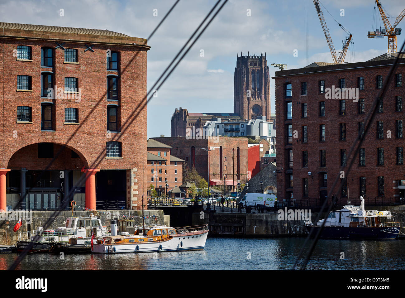 Liverpool albert dock buildings cathedral    Liverpool Cathedral is the Church of England Cathedral of the Diocese of Liverpool, Stock Photo