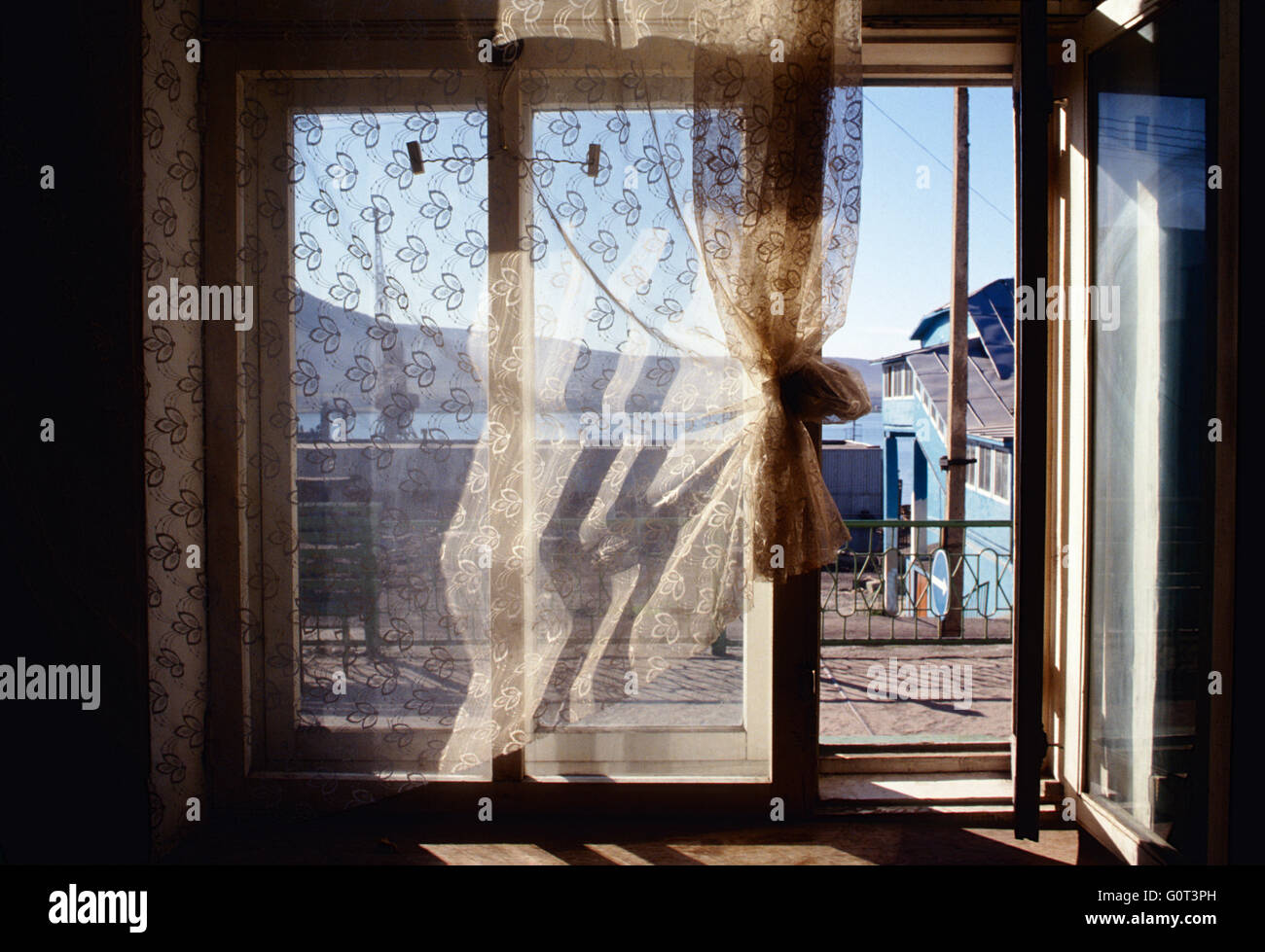 View through window from private home of port city of Provideniya; Magadan Region; Russian Federation; former Soviet Union; USSR Stock Photo