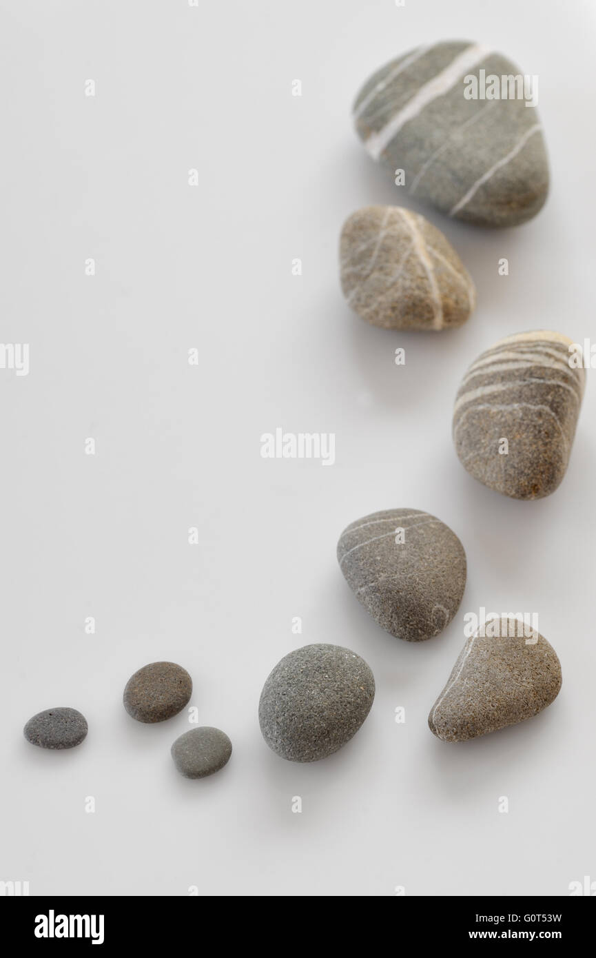 white pebble stone on white background Stock Photo