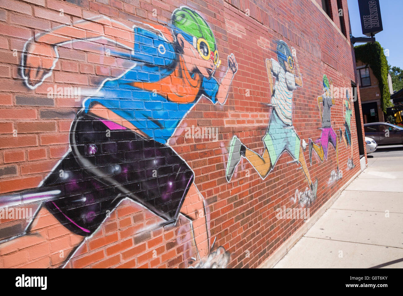 Hebru Brantey Nike Running street mural on a wall in the trendy Stock Photo  - Alamy