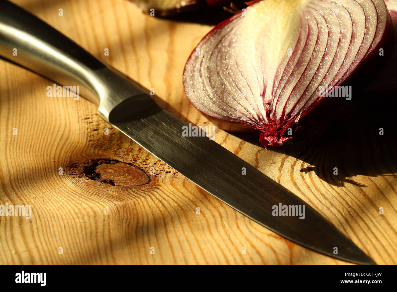 Onion knife cut sunlight Stock Photo Alamy