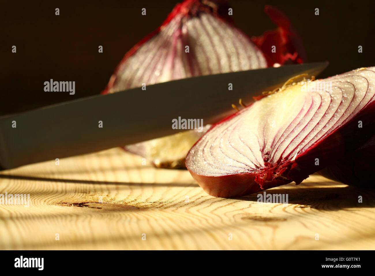 Onion knife cut sunlight Stock Photo Alamy