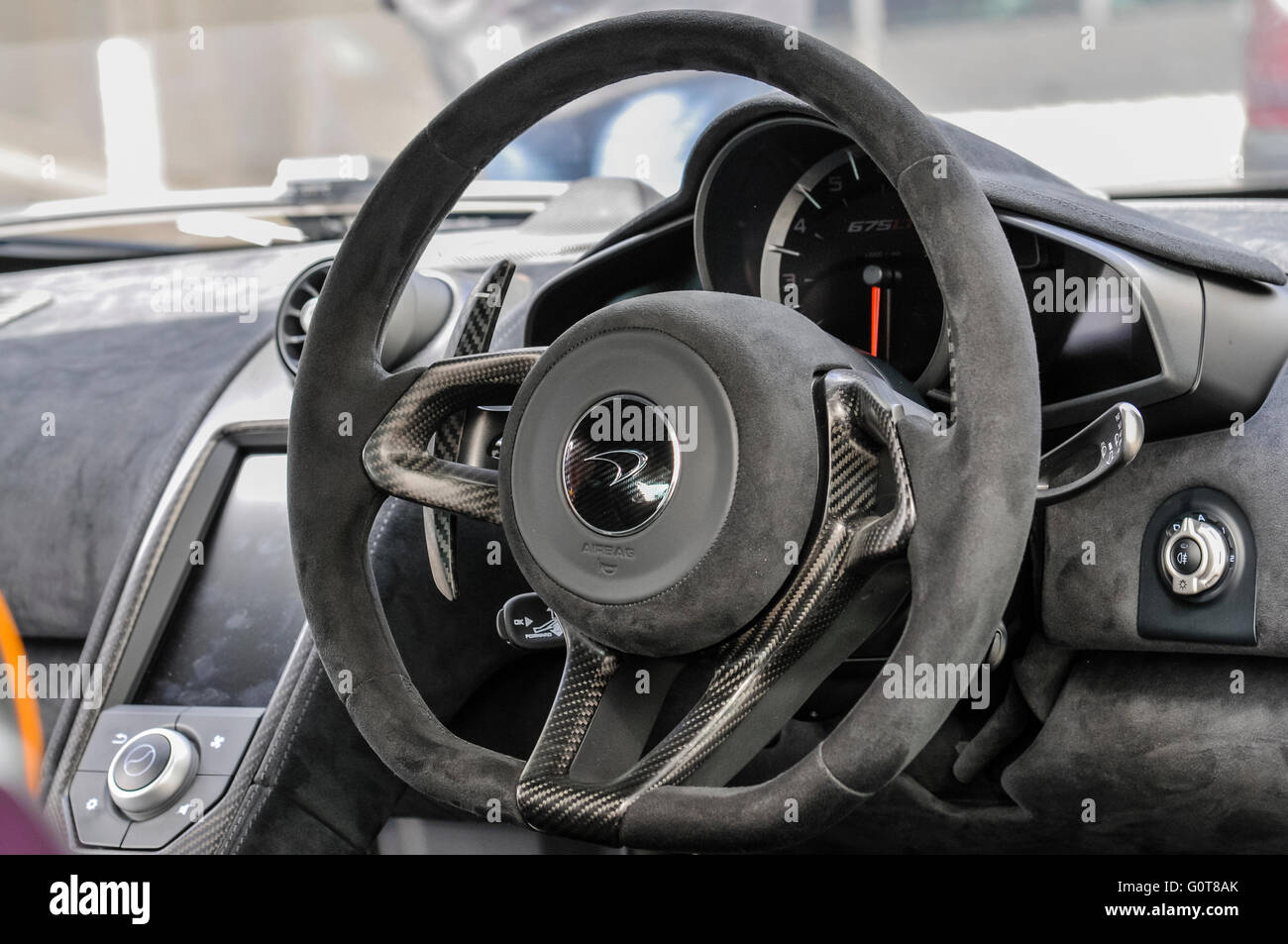 Steering wheel and dashboard of a McLaren 675LT hypercar Stock Photo