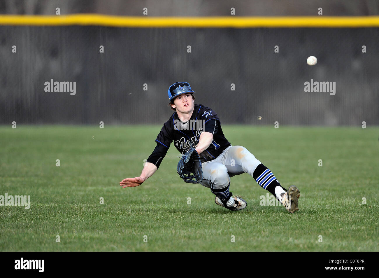 Diving attempt by baseball player hires stock photography and images