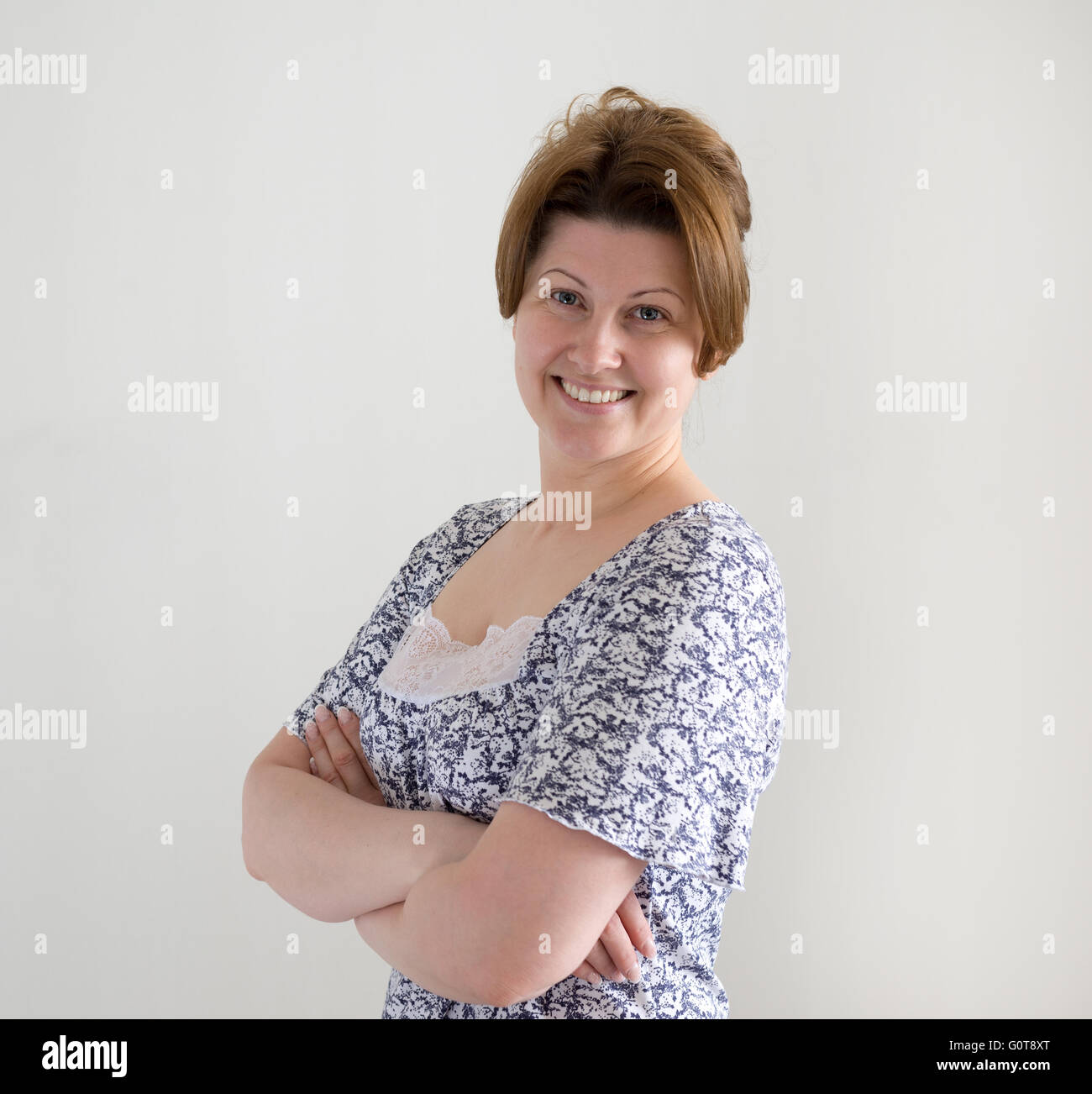 Woman in house clothes on  light background Stock Photo