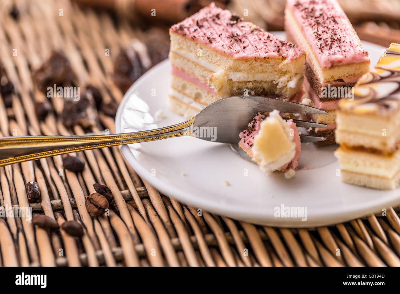 Decorative layered desserts on white plate Stock Photo