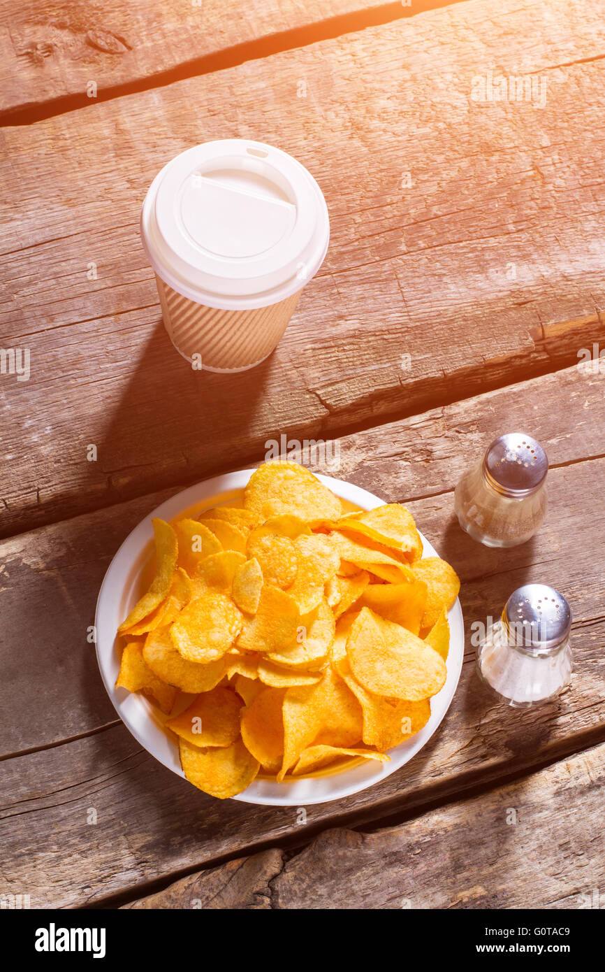 Chips and hot drink cup Stock Photo Alamy