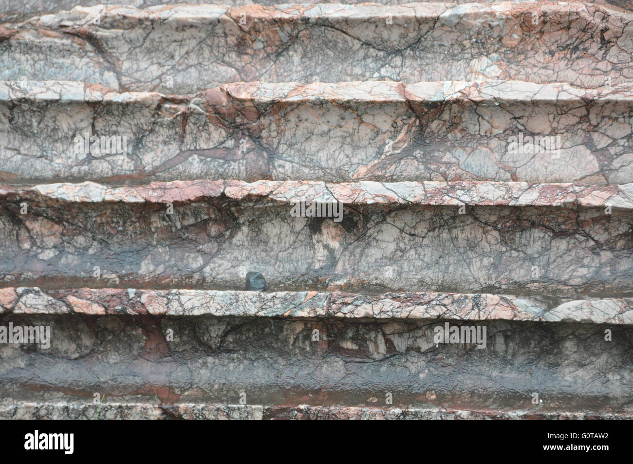 Detail image of a ancient roman marble column on a rainy day in Rome, Italy Stock Photo