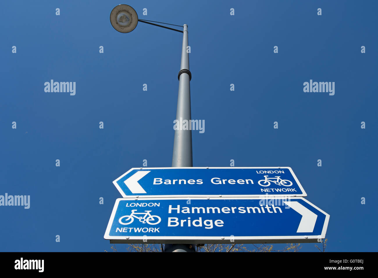 london cycle network directions signs showing routes to hammersmith bridge and barnes green, in