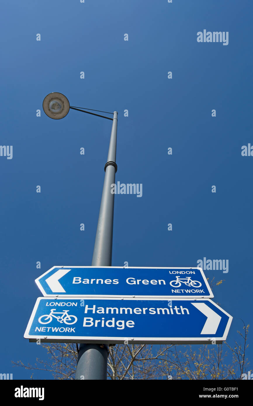 london cycle network directions signs showing routes to hammersmith bridge and barnes green, in