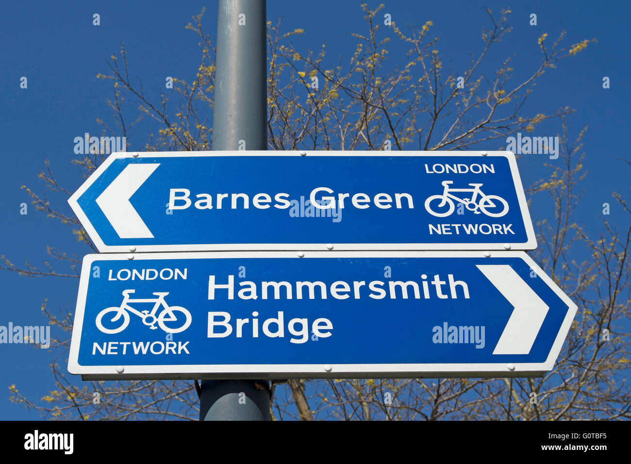 london cycle network directions signs showing routes to hammersmith bridge and barnes green, in