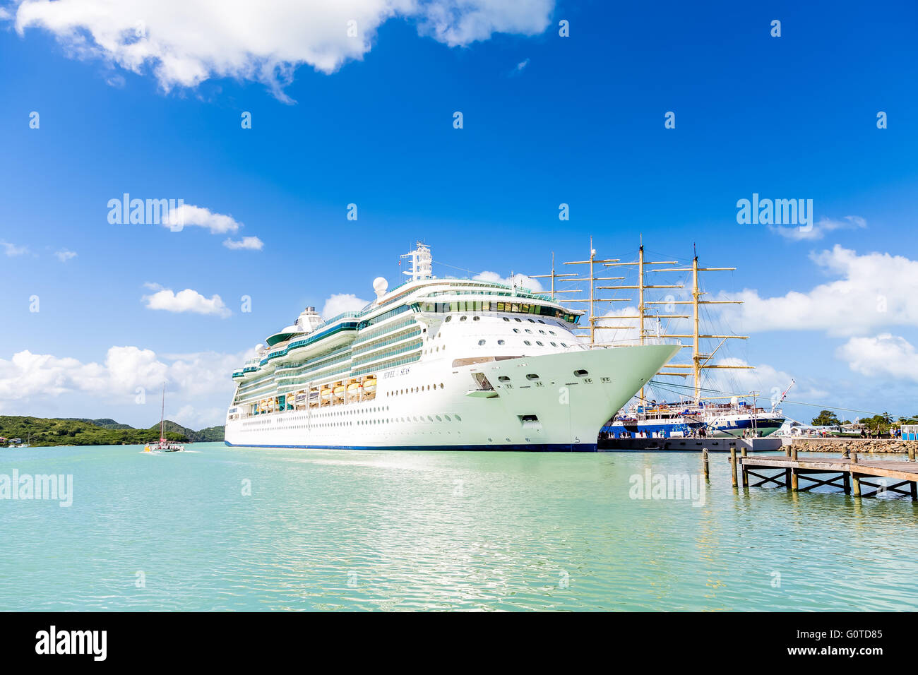 Jewel of the Seas by Wood Masts with tourists Stock Photo