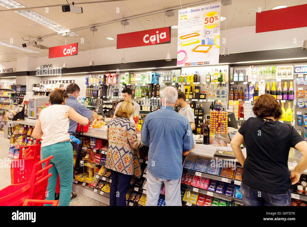 Customers paying for food at the cash tills in a spanish supermarket, Estepona, Costa del Sol, Andalusia, Spain, Europe Stock Photo