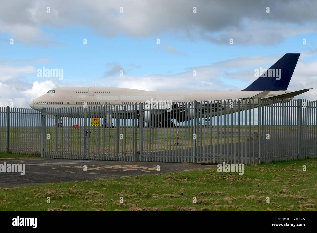 A Boeing 747 awaits decommissioning and dismantling on April 25, 2016 at Cotswold Airport, Kemble, Gloucestershire, England, UK. Stock Photo