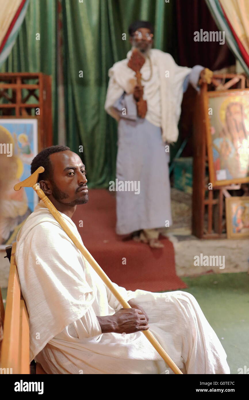 WUKRO, ETHIOPIA-MARCH 29: Orthodox christian devotees attend religious services dressed in gabi-white clothes on March 29, 2013 Stock Photo