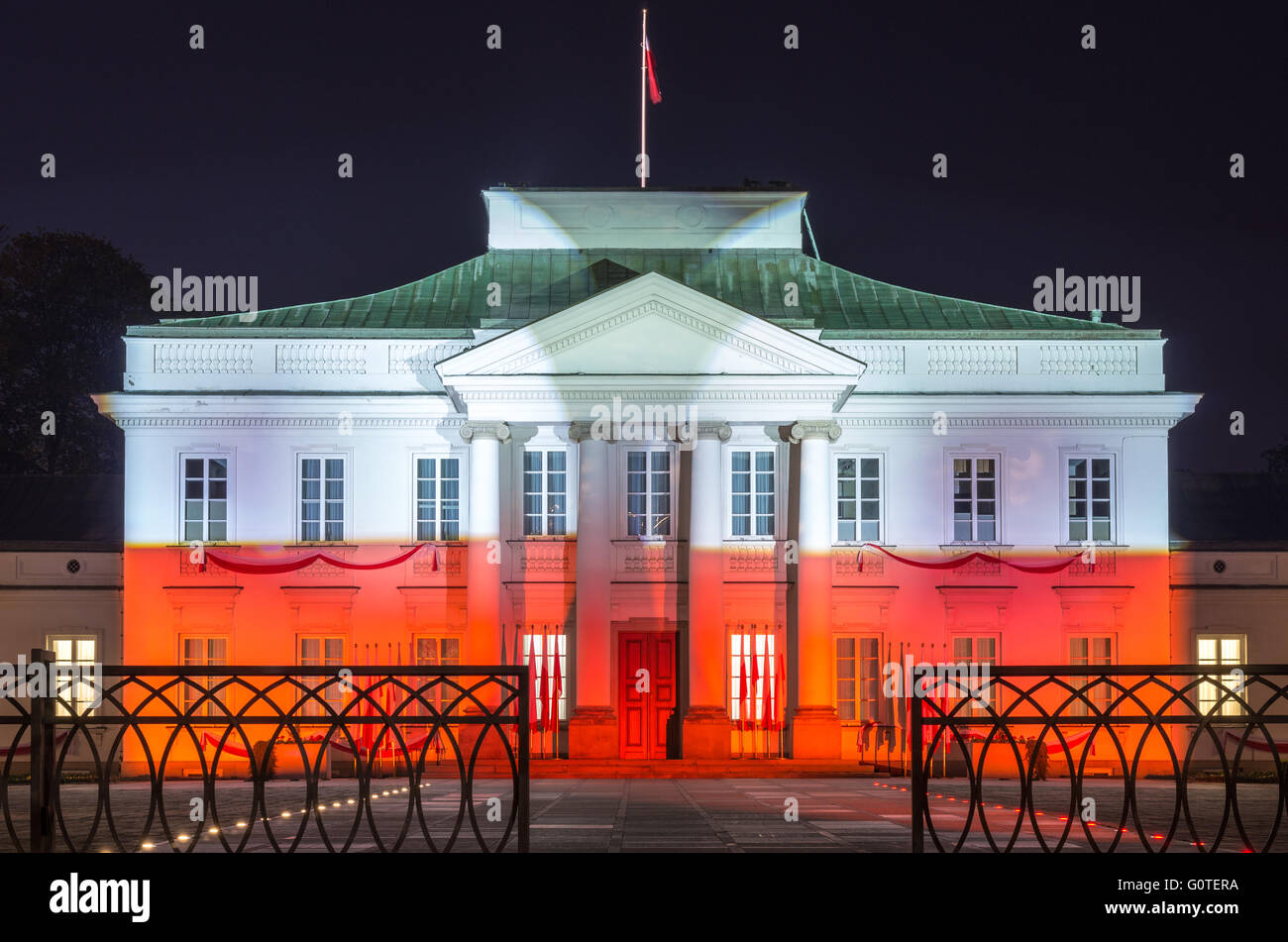 Polish national colours displayed on Pałac Belwederski (Belweder Palace) (west face) Warsaw, Poland Stock Photo