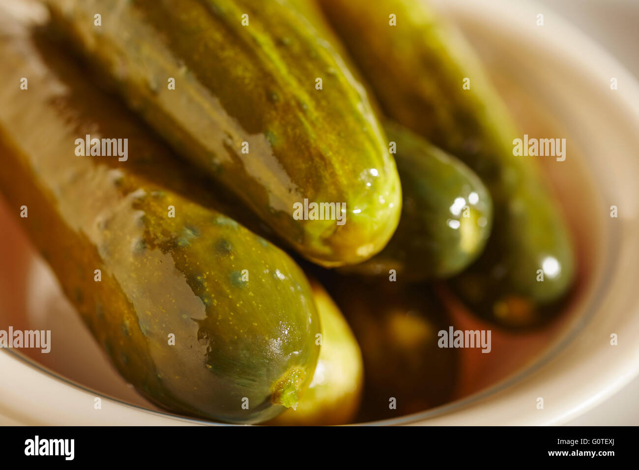half sour kosher pickles Stock Photo