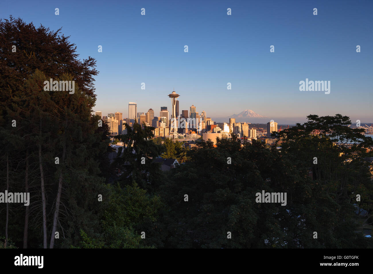 Seattle skyline at sunset from Kerry Park, with Moint Rainier in the background. Seattle, WA, USA. Stock Photo