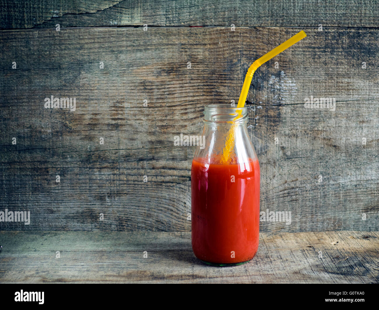 Download Tomato Juice In Glass Bottle With Straw Stock Photo Alamy