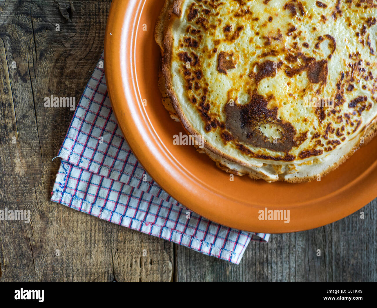 Stack of crepe pancakes on plate Stock Photo