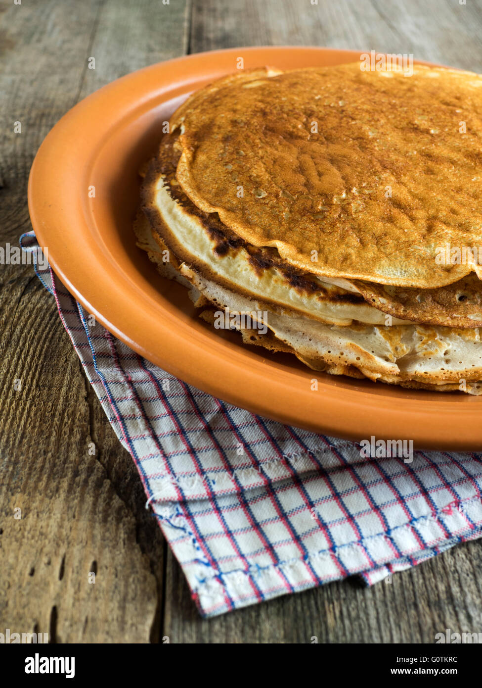 Stack of crepe pancakes on plate Stock Photo