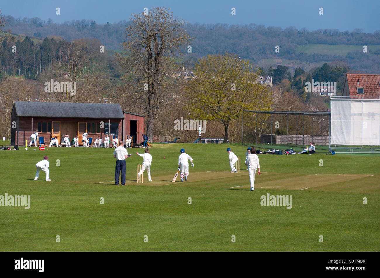 Schoolboys cricket match underway Stock Photo