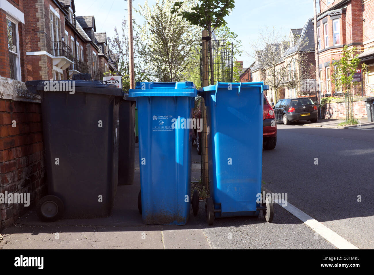 wheelie bins have been left on the pavement blocking the passage of