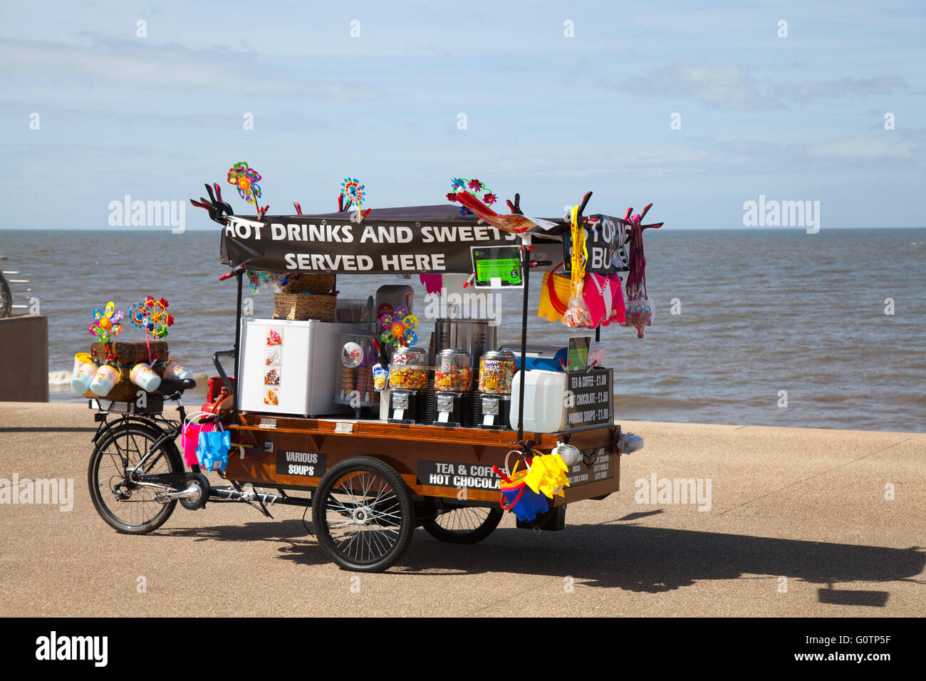 Novelty beach vendor cart, Bar selling Hot Drinks & Sweets, on Tower Promenade, Blackpool, Lancashire, UK Stock Photo