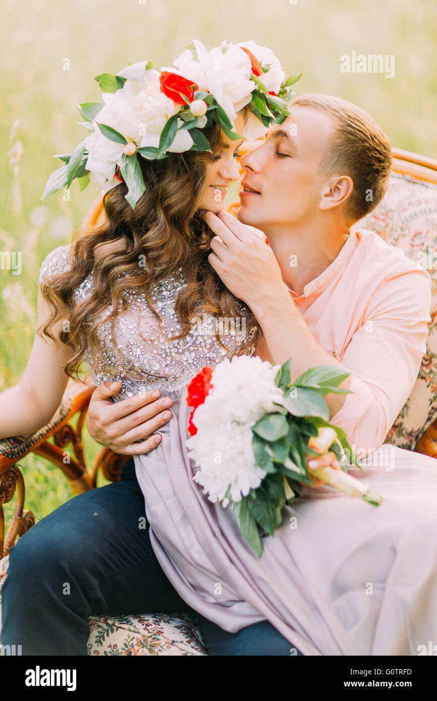 Couple kissing at blooming tree hi-res stock photography and images - Alamy