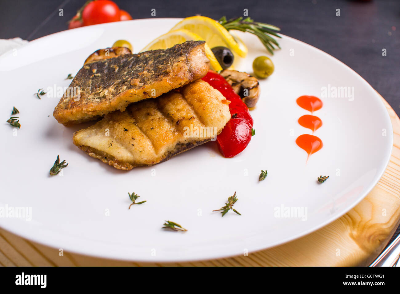 Fish Part Steak Grilled fish steak with vegetables Stock Photo - Alamy