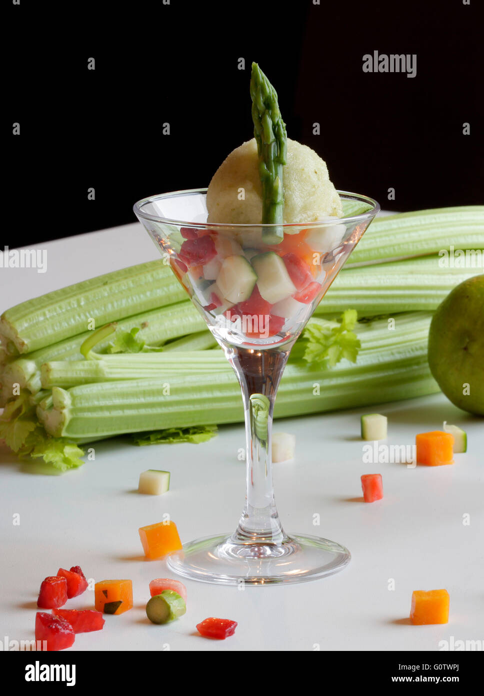 Celery ice with aspargus, lime and fruit salad. Stock Photo