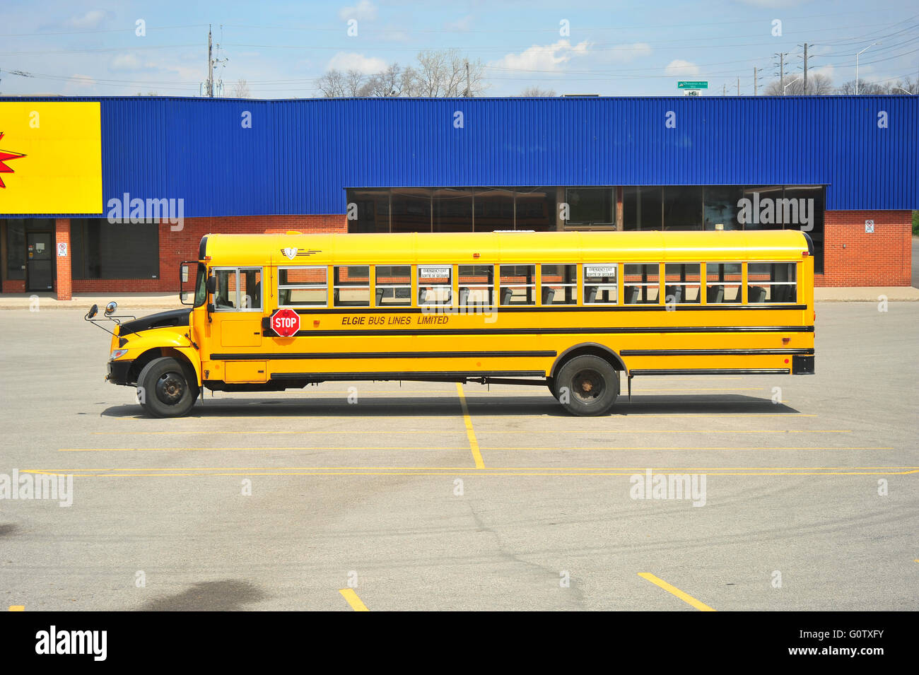 A Canadian school bus parked in a car park in London, Ontario. Stock Photo