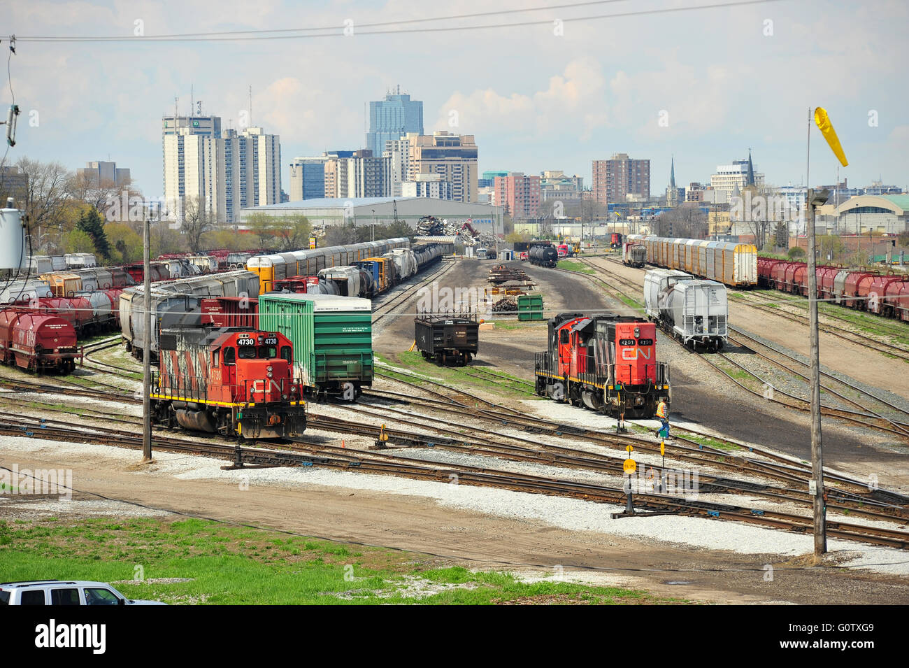 Canadian train engines and freight cars with the city of London Ontario