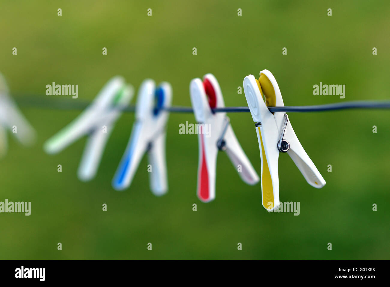 Plastic clothes pegs Stock Photo