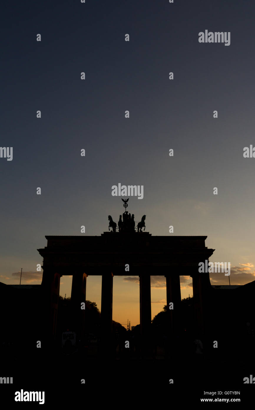 Silhouette of the Brandenburg gate (Brandenburger Tor) at sunset Stock Photo
